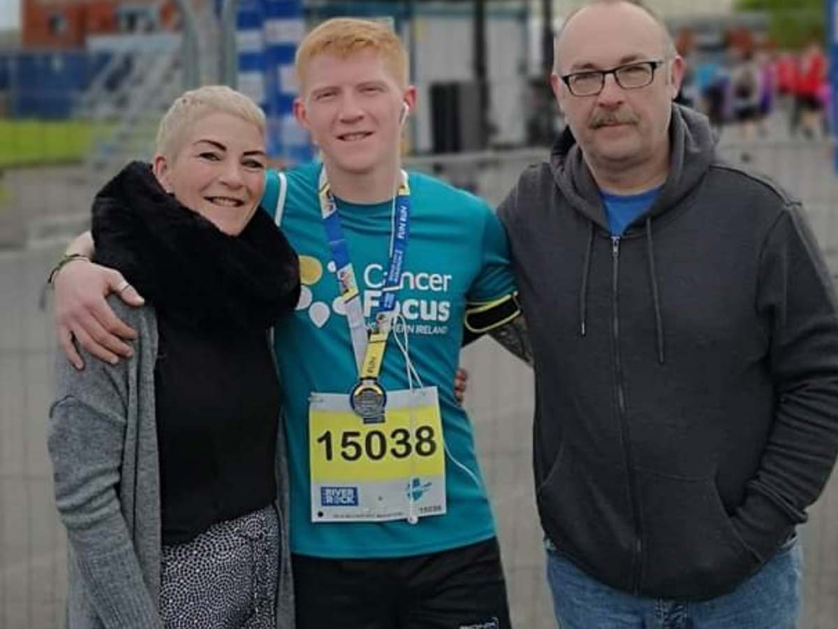 Student gets on the ball and runs for Cancer Focus NI